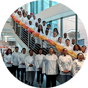 Photo of NOCHI chefs lined up on stairs